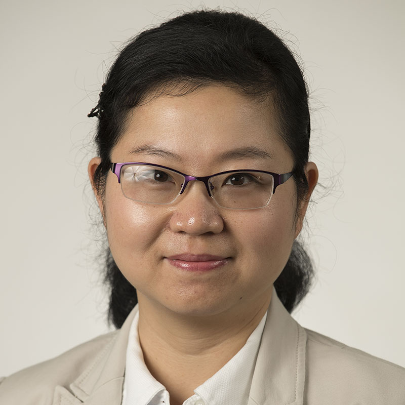 headshot of professor shi